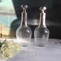 2 1920 s decanters, cut glass and silver carafes, A pair, Decorative bottles. French Boudoir decor. Hallmarked silver, poin on Minerve