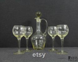 A Beautiful Antique Carafe and Four Wine Glasses