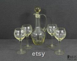 A Beautiful Antique Carafe and Four Wine Glasses