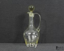 A Beautiful Antique Carafe and Four Wine Glasses