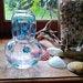A Beautiful Vintage Painted Glass Night Set Carafe And Glass Carafe De Nuit Decorated With Blue Flowers
