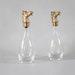 A Set Of Two Vintage Brass Horse Head Carafes.