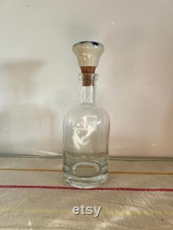 An elegant versatile French 37.5 cl capacity glass, carafe, bottle with a ceramic blue and white push in cork stopper