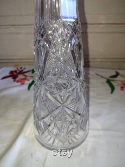 Ancient large crystal decanter cut from crosses and stars