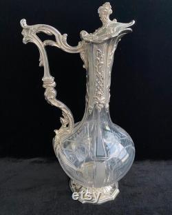 Antique carafe with French silver