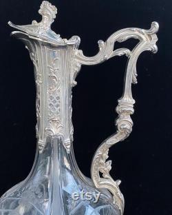 Antique carafe with French silver