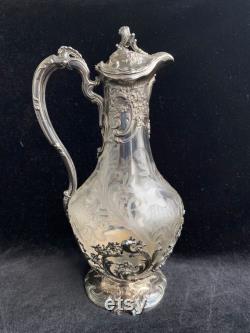 Antique crystal carafe with silver