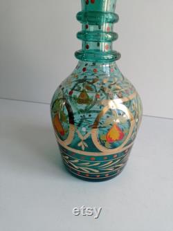 Bohemian vintage carafe in green glass, with spire stopper, circa late 19th century.