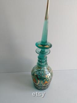 Bohemian vintage carafe in green glass, with spire stopper, circa late 19th century.