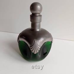 Chunky and heavy glass green glass and pewter carafe wine decanter with stopper.