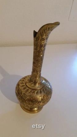 Golden wine carafe art object