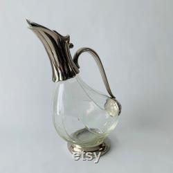 Heavily silver plated duckbill Decanter, with beautifully decorated glass.
