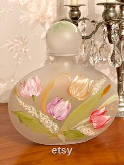 Large decanter in enamelled glass. Enamelled floral decoration.27 cm x 25 cm. Signed.