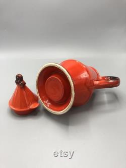 Mid century handmade orange ceramic coffee tea pitcher with a top cover 1970 s