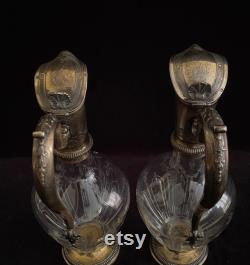 ODIOT, FRANCE, pair crystal carafes with silver