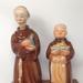 Pair Western Germany Friors Monks -carrying Turkey And Wine Carafes.
