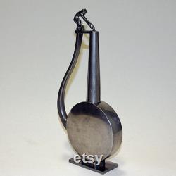 Pewter jug with a faun lid top by GAB Tenn, Sweden 1933