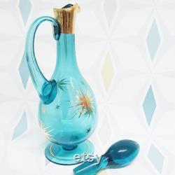 Tall gold starburst aqua blue glass carafe