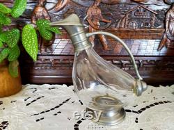 Traditional French carafe,Vintage glass pot. The lux container for wine, fruit juice or water. Vintage from the 1950s.
