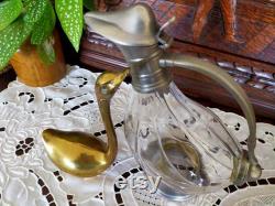 Traditional French carafe,Vintage glass pot. The lux container for wine, fruit juice or water. Vintage from the 1950s.