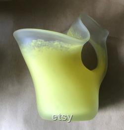 Transparent and yellow water carafe