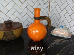 Vintage MCM tangerine orange ceramic carafe with wooden handle. Beautiful modern style Free shipping