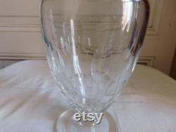 crystal decanter engraved with floral decor and foliage